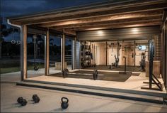 a home gym is lit up at night