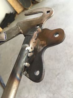 a close up of a bike handlebar with tools on it