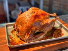 a whole chicken sitting on top of a pan