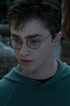 harry potter in glasses looking at the camera