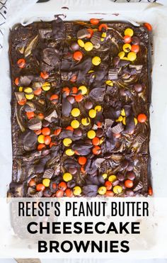 reese's peanut butter cheesecake brownies on a sheet pan