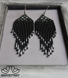 These black evening earrings are made of high-quality Czech beads and strong synthetic thread. They are elegant, fashionable, and highly versatile, suitable for everyday wear. Features: Sterling silver components Color: silver, black. This item is currently in stock. You must be completely satisfied. If you find merchandise unsatisfactory for any reason, return it within 10 days and your money will be refunded without questions. More beaded earrings http://etsy.me/2ycItdb Gerdan necklaces http:/ Handmade Chandelier Earrings For Evening, Black Beaded Drop Earrings, Black Beaded Fringe Earrings As Gift, Elegant Beaded Fringe Earrings, Elegant Black Beaded Chandelier Earrings, Elegant Black Beaded Drop Earrings, Elegant Black Beaded Dangle Earrings, Handmade Beaded Drop Earrings For Evening, Handmade Drop Earrings For Evening