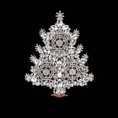 a crystal christmas tree on a black background