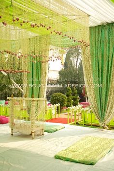 an image of a wedding venue with green and white decor