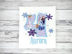 a frozen princess birthday napkin with an image of the number thirteen and snowflakes on it