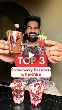 a man is holding up some strawberries in front of his face and the words top 3 strawberry desserts in bandara