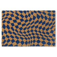 a blue and yellow door mat with an abstract design