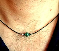 This simple tiny choker necklace made with natural emerald stone bead, black hematite and stainless steel beads on black wax cotton cord, stainless stel lobster clasp closure. Delicate rope choker in surfer style will be a great gift for him. Emerald stone bead: 6 mm Stainless steel beads: 3 mm Emerald Benefits: - Gain wisdom and improve intellectual power. According to Vedic astrology, the Emerald stone represents the planet mercury, ruling planet of intellect. ... - Become more creative and in Green Spiritual Jewelry With Adjustable Cord, Minimalist Waxed Cord Jewelry As Gift, Adjustable Green Necklace With Waxed Cord, Adjustable Green Waxed Cord Necklace, Minimalist Gemstone Beads Choker As Gift, Adjustable Pendant Jewelry With Waxed Cord, Minimalist Jewelry With Adjustable Waxed Cord, Minimalist Gemstone Beads Choker Gift, Green Waxed Cord Jewelry With Sliding Knot