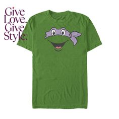 a green t - shirt with an image of a smiling turtle on it's chest