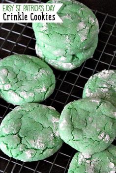 four green cookies on a cooling rack with the words easy st patrick's day crinkle cookies