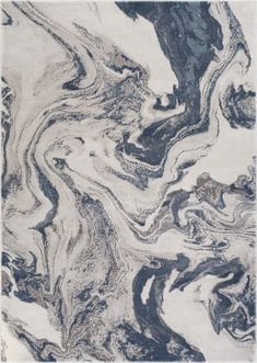 an abstract painting with black and white paint on the ground, it looks like marble