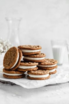 a stack of cookies with white frosting on top