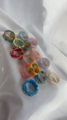 the best rings that will suit any outfit this summer! these colour mixed rings will add to are a must🥰 resin open backed rings but will not stretch to more sizes, please check the size chart in the last picture to double check your size before purchase🚨 + only £1 delivery Colourful Rings, Trendy Open Ring For Summer, Trendy White Rings For Summer, Handmade Multicolor Summer Ring, Nail Polish Rings, Cute Rings Resin, Resin Rings, Clay Rings, Chunky Resin Rings