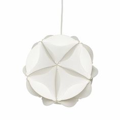 an origami lamp hanging from a white cord