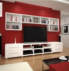 an image of a living room with red walls and white entertainment center in the middle