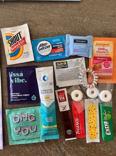 the contents of an emergency kit are laid out on the floor next to each other