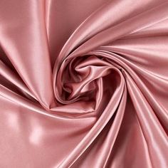 Add an element of elegance to your sewing creations with Dusty Rose Poly Satin Fabric! Featuring a light pink color and a sleek top surface, this fabric is fit for a wide range of creations. This simply stunning satin will make you shine with sophisticated style! Details: 	 Width: 58" 	 Weight: Very Lightweight 	 Country Of Origin: China 	 Content: 100% Polyester 	 Care: Machine Wash, Warm; Delicate Cycle; Tumble Dry, Low; Use Cool Iron. Do Not Bleach. 	 Flammability Note: Not For Sleepwear Avai Bath Inspiration, Dusty Rose Color, Wedding Color Palette, Light Pink Color, Satin Color, Wedding Mood, Pink Silk, Rose Color, Hobby Lobby