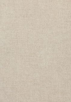 a beige fabric textured with small dots