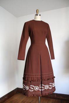 "Lovely brown dress from the 1960s with a really cool white floral embroidered hem. Zipper up the back.  Label: none  Measurements: { small } Bust: 34\"  Waist: 26\"  Hips: 38\" Length: 45\" Sleeve Length: 23.5\" Condition: excellent vintage condition with minor signs of wear - sold as found. washed and ready to wear ☆Shop more☆ http://www.trunkofdresses.com/" Embroidered Hem, 1960s Dress, 1960's Dress, Brown Dress, Vintage 1960s, Small Bust, Dress Clothes For Women, Off Sale, Dress To Impress