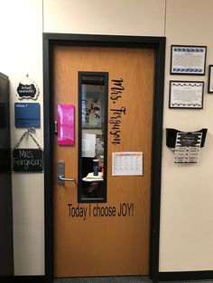 an office door with the words today i choose joy written on it and a phone