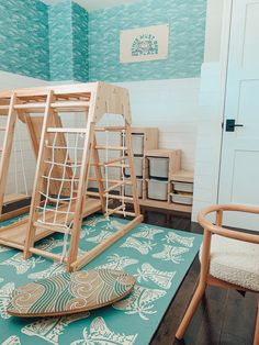 a child's play room with a wooden swing set