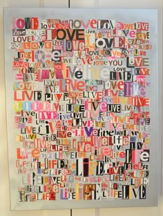 an art piece with words written in different colors and sizes on the side of a door