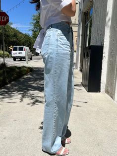 DESCRIPTION This baggy jean is featured in a high-rise with straight-out silhouette. DETAILS Zip fly and button closure, Belt loop at waist FIT & SIZEING 25" waist 35" hip 28 1/2" inseam based on size SModel is 5'2" waist (25"-26") is wearing a size S PRODUCT INFO & CARE Size: S,M Color: Denim ● Fabric: 100% cotton● Machine wash cold gentle cycle. Do not bleach Everyday High Rise Cargo Jeans For Spring, Spring High Rise Mom Jeans, High Rise Cargo Jeans For Everyday Spring Wear, Straight Denim Bottoms For Spring, Mid-rise Cargo Jeans For Everyday Spring, Everyday Spring High Rise Cargo Jeans, Spring Mid-rise Everyday Cargo Jeans, Oversized High Waist Medium Wash Jeans, Oversized High-waist Medium Wash Jeans