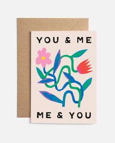 a card with the words you & me and flowers in blue, pink, green, red