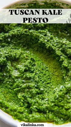 a white bowl filled with green pesto