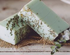 a bar of soap sitting on top of a wooden table