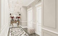 an elegant hallway with white walls and flooring