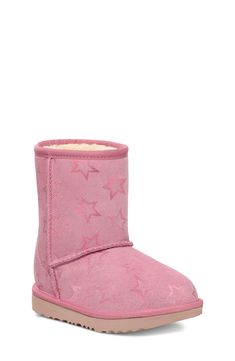 Metallic stars scatter on the suede upper of this cozy, kid-size boot lined with a UGGplush, a moisture-wicking textile made from a wool-rich blend but crafted to feel and wear like genuine shearling. Leather upper/UGGplush wool-blend lining/synthetic sole Imported Star Boots, Pink Iridescent, Youth Shoes, Kids Uggs, Girls Shoes Kids, Ugg Classic, Shoe Insoles, Kids Sandals, Girls Boots