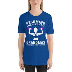 Put your humor mode on with this tee that reads Assuming I Was Like Most Grandmas Was Your First Mistake in distressed style with a silhouette of a lady holding dumbbell weights! If you love working out or enjoy reading funny English sayings, quotes, phrases, this is just for you! Comfortable & fashionable to wear during any occasion, celebrations, family gatherings, parties, events & work! The best present or birthday gift idea for your awesome family & friends! Guaranteed to turn h Funny Text Crew Neck Top For Gym, Funny Text Crew Neck Gym Top, Funny Text Short Sleeve Gym Tops, Short Sleeve Gym Top With Funny Text, Funny Crew Neck Gym Tops, Funny Gym Tops With Crew Neck, Funny Letter Print Gym Tops, Funny Short Sleeve Workout Tops, Holding Dumbbell