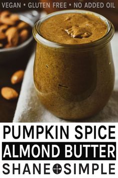 pumpkin spice almond butter is in a glass jar