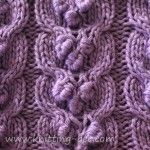 an image of a purple knitted blanket