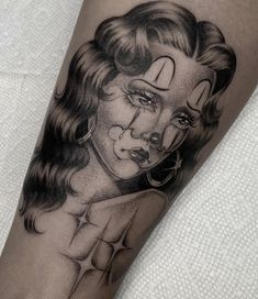 a woman's face is shown on the arm