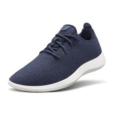 The Allbirds Wool Runner is the orginal wool sneaker that started it all. Called the world's most comfortable shoe, it's flexible, supportive, astonishingly soft, and machine washable. The Wool Runner is breathable, lightweight, and can be worn sockless. Best used for walking, cooler weather, and everyday casual wear. Indigo Shoes, Wool Sneakers, Wool Shoes, Lipstick Bag, Chain Strap Bag, Oversized Tote Bag, Lightweight Sneakers, Most Comfortable Shoes, Travel Shoes