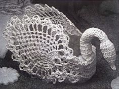 an image of a crocheted swan in black and white