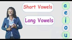 a woman standing in front of a sign that says short voiels and long voiels