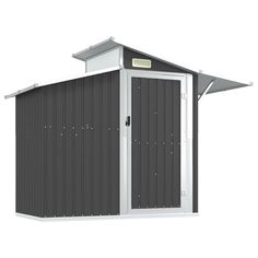 a gray shed with a white roof