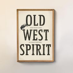 an old west spirit poster hangs on the wall