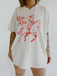 These tees are printed on super soft Comfort Colors, providing a relaxed unisex fit with a worn-in look and feel. This collection offers our most expanded size range from S-3X.Looking for these tees to fit oversized? Size up 1-2 sizes.Model has sized up to an XL for an oversized fit.• 100% ring-spun cotton• Garment-dyed• Relaxed fitThis product is made especially for you as soon as you place an order, please see the banner on the top of our site for current turnaround times. Making products on d Sport Style Outfits, Grunge Hippie, Oversized White Shirt, Camila Morrone, Outfit Streetwear, Summer Graphic Tee, Retro Graphic Tees, Women Encouragement, Ride Or Die