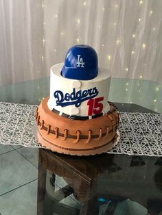 a baseball themed cake on top of a table