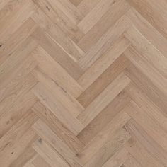 an image of wood flooring that looks like herringbones