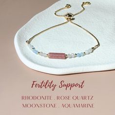 The bracelet combines the gentle energies of rhodonite, rose quartz, moonstone, and aquamarine. They are said to bring support for a successful and safe pregnancy, creating a harmonious synergy to support fertility. A thoughtful gift for new mom or a beautiful accessory for your own pregnancy journey. It is also a perfect gift for whom trying to get pregnant. * * * DETAILS * * * ✦ Materials:  - Rhodonite: approx. 4mm x 13mm - Moonstone: approx. 3mm - Aquamarine: approx. 3mm - Rose Quartz: approx Fertility Gemstone Bracelet, Tube Rose, Minimalist Pink Rose Quartz Bracelet, Fertility Crystals, Adjustable Rose Quartz Stretch Bracelet, Spiritual Style, Hand-strung Spiritual Rose Quartz Stretch Bracelet, Adjustable Rose Quartz Bracelets - Spiritual Style, Trying To Get Pregnant, Moonstone Crystal