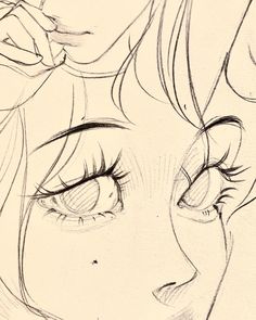 a drawing of a woman's face with long eyelashes