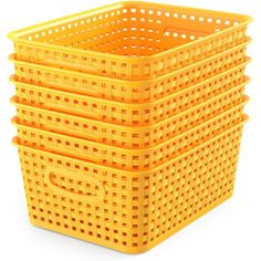 four yellow plastic baskets stacked on top of each other in front of a white background