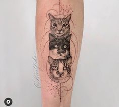 a woman's leg with three cats on it