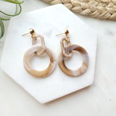 Cora is a fun chain style in our unique resin material. The gorgeous neutral tones will match anything. Details: 18K gold-plated hypoallergenic stainless steel posts 8mm posts Lightweight resin charms Link Earrings, Hand Poured Candle, Acrylic Charms, Resin Charms, Resin Material, Neutral Tones, Colour Tone, Custom Items, Chain Styles