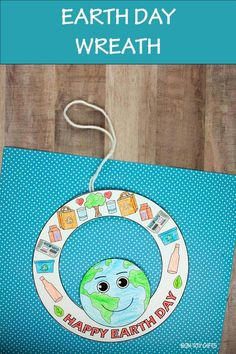 an earth day wreath with the words happy earth day on it